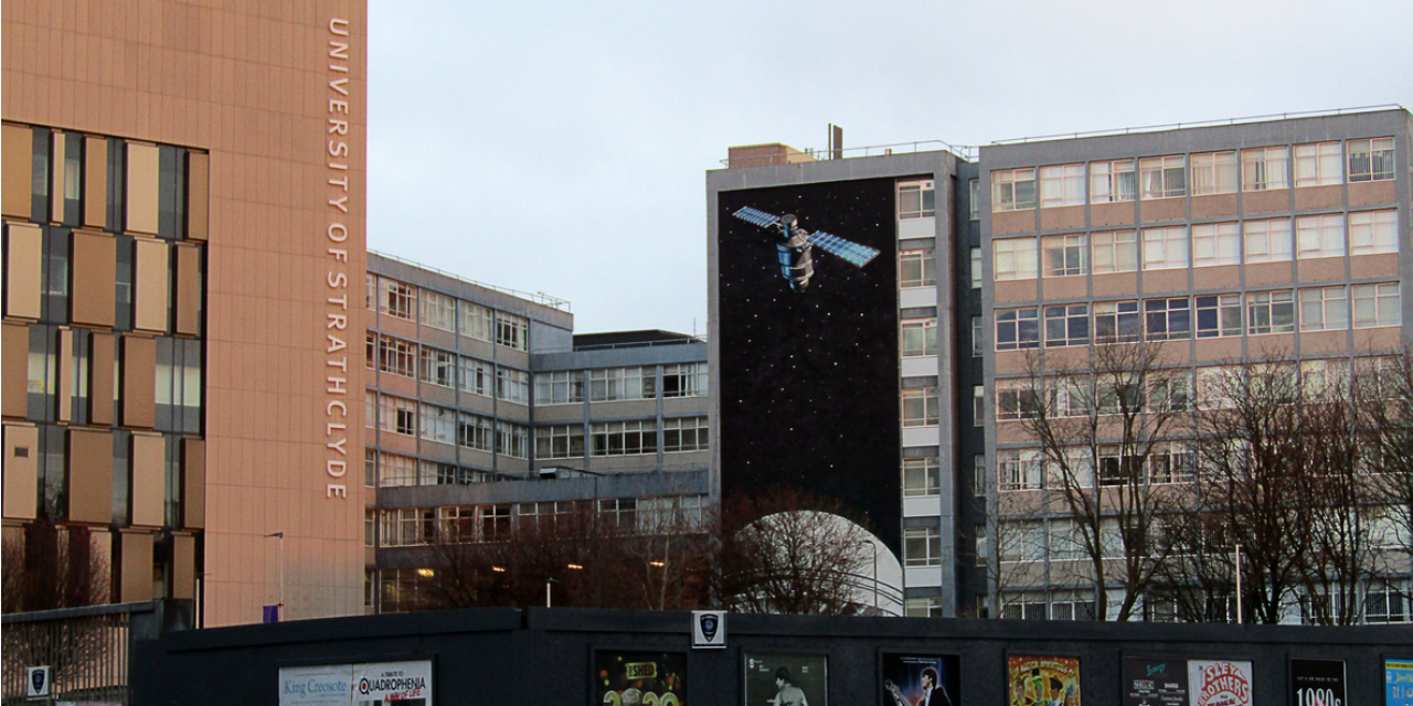 The University of Strathclyde campus featuring a mural of a space satellite