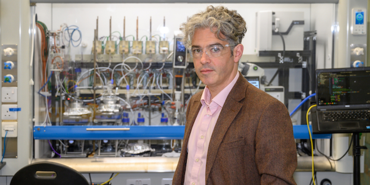 Professor Lee Cronin, Chemify CEO, stands in a lab.