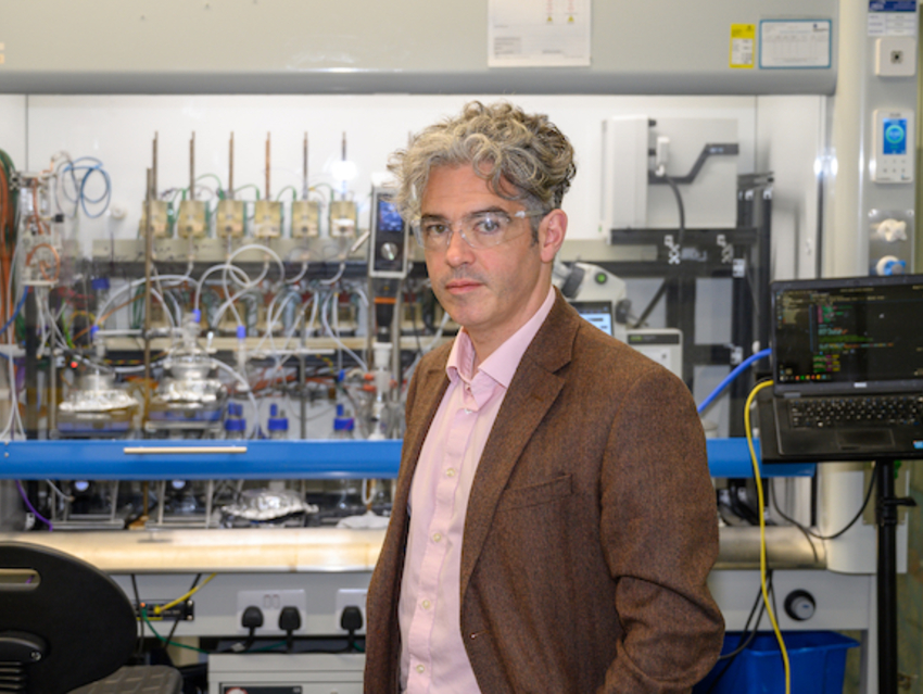 Professor Lee Cronin, Chemify CEO, stands in a lab.