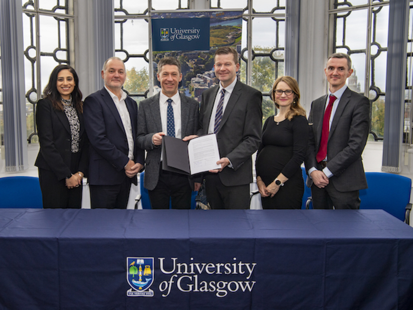 Senior staff from the University of Glasgow and Glasgow Clyde College gather to sign the MoU