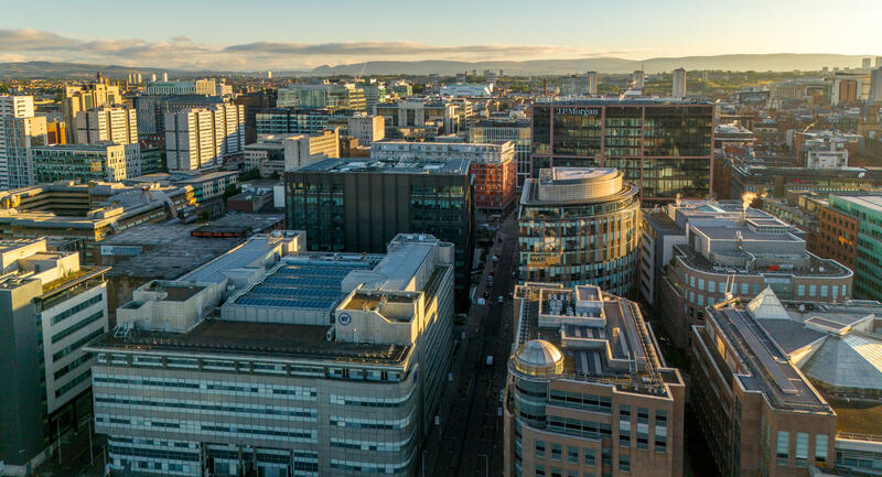 Aerial photo of Glasgow's IFSD: A dense quarter of businesses and offices. BT and Morgan Stanley are prominent.