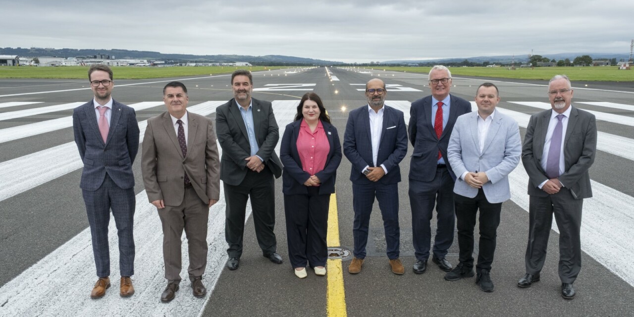 Glasgow City Region Cabinet pictured on the runway at Glasgow Airport.
Cabinet Chair and Leader of Glasgow City Council, Susan Aitken (centre), with Kam Jandu, CEO AGS Airports (centre right).